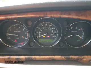 2004 Jaguar XJ R z VIN SAJWA73B44TG20291, wystawiony jako Copart lot #54452375 z przebiegiem 148 491 mil mil oraz Czysty tytuł • Clean title. Historia ofert i sprzedaży dostępna na DreamBid. Obrazek 9.