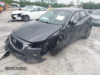 2017 Mazda CX-3 Touring z VIN JM1DKDC7XH0173046, wystawiony jako IAAI lot #42378951 z przebiegiem 223 122 mil mil oraz . Historia ofert i sprzedaży dostępna na DreamBid. Obrazek 2.