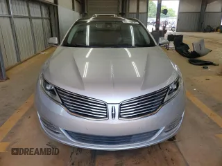 2015 Lincoln MKZ Hybrid z VIN 3LN6L2LU1FR606066, wystawiony jako Copart lot #61955415 z przebiegiem 127 214 mil mil oraz Szkoda całkowita • Salvage title. Historia ofert i sprzedaży dostępna na DreamBid. Obrazek 5.