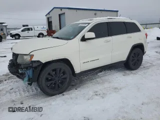 2012 Jeep Grand Cherokee Laredo with VIN 1C4RJFAT4CC335104, listed as a Copart auction lot 45306185 with 120,086 mi miles and Salvage Title. Bid and sale history available at carsss.com. Image 1.