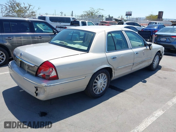 2008 Mercury Grand Marquis LS z VIN 2MEFM75V08X662376, wystawiony jako IAAI lot #42414652 z przebiegiem 86 537 mil mil oraz . Historia ofert i sprzedaży dostępna na DreamBid. Obrazek 4.