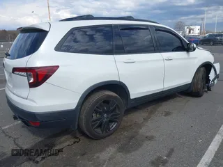 2021 Honda Pilot Black Edition z VIN 5FNYF6H72MB067664, wystawiony jako IAAI lot #42025998 z przebiegiem 52 791 mil mil oraz . Historia ofert i sprzedaży dostępna na DreamBid. Obrazek 4.