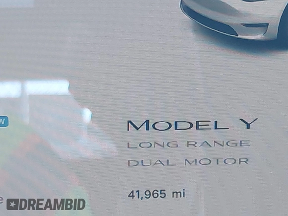 2022 Tesla Model Y Long Range z VIN 7SAYGDEE8NF374636, wystawiony jako IAAI lot #41545669 z przebiegiem 41 965 mil mil oraz . Historia ofert i sprzedaży dostępna na DreamBid. Obrazek 15.