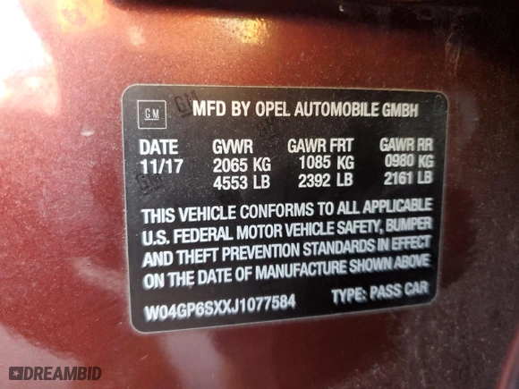 2018 Buick Regal Sportback Essence with VIN W04GP6SXXJ1077584, listed as a Copart auction lot 77544934 with 42,081 mi miles and Salvage Title. Bid and sale history available at carsss.com. Image 12.