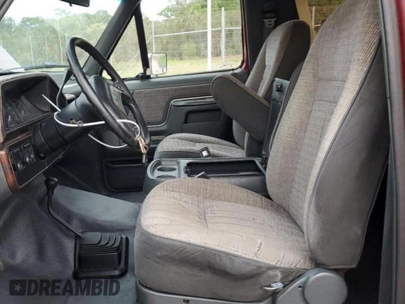 1990 Ford Bronco Custom with VIN 1FMEU15H2LLA70449, listed as a Copart auction lot 77953604 with 12,519 mi miles and Salvage Title. Bid and sale history available at DreamBid. Image 7.