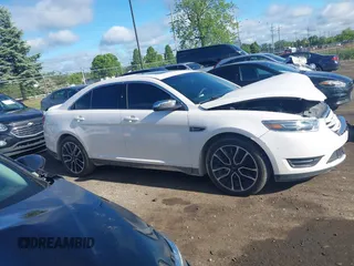 2017 Ford Taurus Limited z VIN 1FAHP2J85HG115863, wystawiony jako IAAI lot #42336857 z przebiegiem 152 890 mil mil oraz . Historia ofert i sprzedaży dostępna na DreamBid. Obrazek 13.