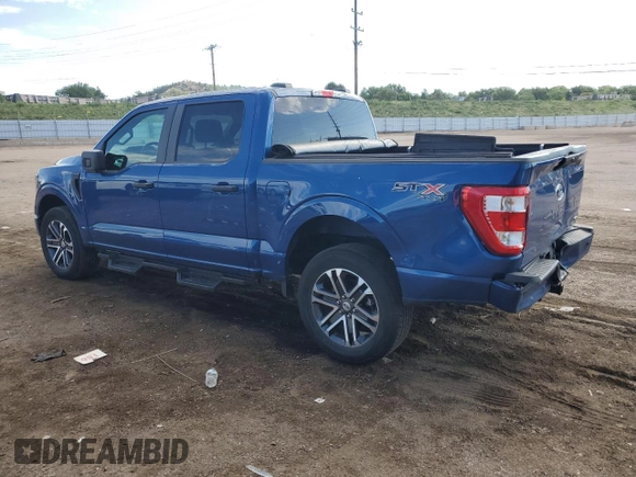 2023 Ford F-150 XL with VIN 1FTEW1EP8PKE04419, listed as a Copart auction lot 60843835 with 31,684 mi miles and Salvage title. Bid and sale history available at DreamBid. Image 2.