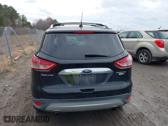 2016 Ford Escape Titanium with VIN 1FMCU9J91GUA59639, listed as a IAAI auction lot 41058369 with 138,046 mi miles. Bid and sale history available at carsss.com. Image 17.