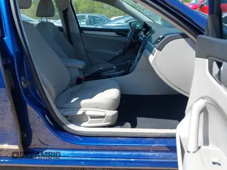 2016 Volkswagen Passat S with VIN 1VWAT7A36GC048458, listed as a IAAI auction lot 42001799 with 50,962 mi miles and . Bid and sale history available at DreamBid. Image 5.