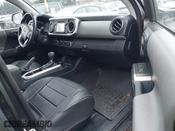 2017 Toyota Tacoma SR5 with VIN 3TMAZ5CN5HM038170, listed as a IAAI auction lot 41588399 with 152,469 mi miles. Bid and sale history available at carsss.com. Image 5.
