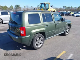 2009 Jeep Patriot Sport with VIN 1J4FT28B99D139661, listed as a IAAI auction lot 41644514 with 155,117 mi miles and . Bid and sale history available at DreamBid. Image 4.