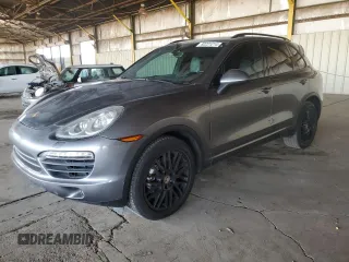 2012 Porsche Cayenne S Hybrid z VIN WP1AE2A27CLA92565, wystawiony jako Copart lot #82221214 z przebiegiem 130 210 mil mil oraz Szkody całkowita. Historia ofert i sprzedaży dostępna na DreamBid. Obrazek 1.
