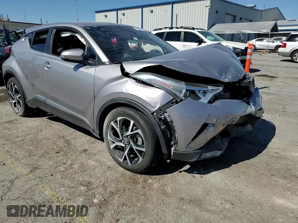 2018 Toyota C-HR XLE z VIN NMTKHMBX5JR014024, wystawiony jako Copart lot #56367465 z przebiegiem 79 882 mil mil oraz Szkoda całkowita • Salvage title. Historia ofert i sprzedaży dostępna na DreamBid. Obrazek 13.