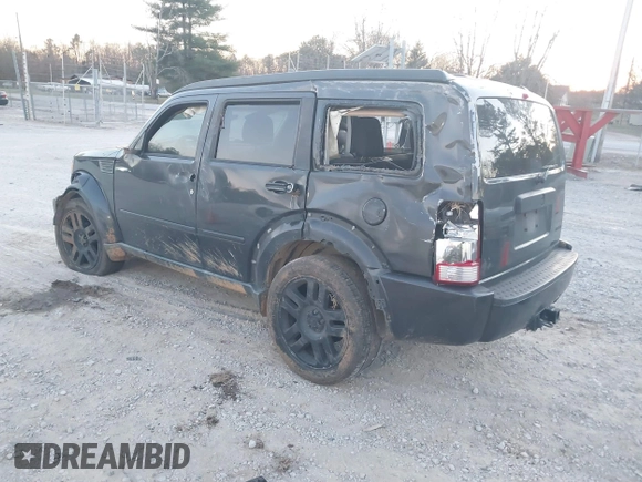 2010 Dodge Nitro SE with VIN 1D4PT2GK3AW137797, listed as a IAAI auction lot 41689701 with 182,452 mi miles. Bid and sale history available at carsss.com. Image 3.