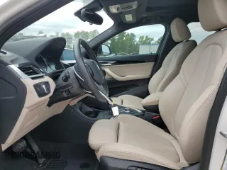 2022 BMW X2 sDrive28i with VIN WBXYH9C0XN5T46405, listed as a Copart auction lot 70291554 with 28,035 mi miles and Salvage Title. Bid and sale history available at carsss.com. Image 7.