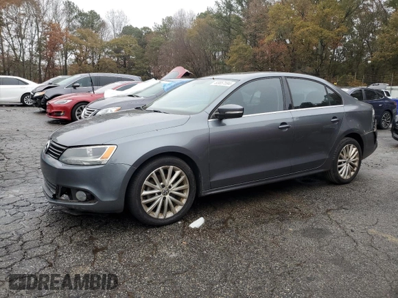 2012 Volkswagen Jetta Sedan SEL w/Sunroof with VIN 3VWLX7AJ7CM389484, listed as a Copart auction lot 83857594 with 212,348 mi miles and Salvage Title. Bid and sale history available at carsss.com. Image 1.