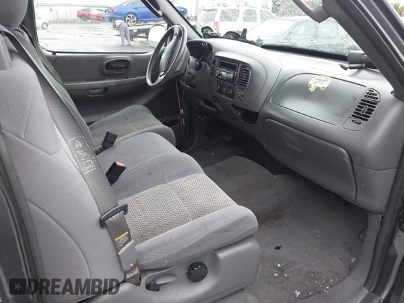2003 Ford F-150 XL with VIN 1FTRX17W03NB51687, listed as a IAAI auction lot 41712022 with 183,428 mi miles. Bid and sale history available at carsss.com. Image 5.