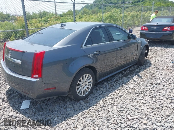 2011 Cadillac CTS with VIN 1G6DC5EY0B0163841, listed as a IAAI auction lot 42409886 with 119,231 mi miles and . Bid and sale history available at DreamBid. Image 4.