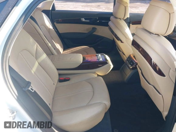 2014 Audi A8 3.0T z VIN WAURGAFDXEN006902, wystawiony jako IAAI lot #41099662 z przebiegiem 118 734 mil mil oraz . Historia ofert i sprzedaży dostępna na DreamBid. Obrazek 5.