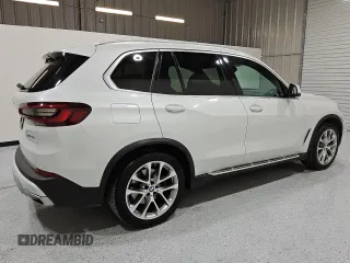 2023 BMW X5 sDrive40i with VIN 5UXCR4C09P9P91719, listed as a Copart auction lot 54630005 with 52,265 mi miles and Clean Title. Bid and sale history available at carsss.com. Image 3.