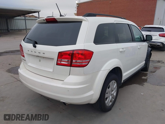 2020 Dodge Journey SE Value with VIN 3C4PDCAB4LT254595, listed as a IAAI auction lot 41572159 with 124,804 mi miles and . Bid and sale history available at carsss.com. Image 4.