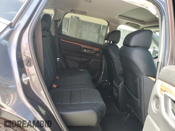 2020 Honda CR-V Touring with VIN 2HKRW2H96LH677520, listed as a Copart auction lot 52264155 with 33,909 mi miles and Salvage Title. Bid and sale history available at DreamBid. Image 12.