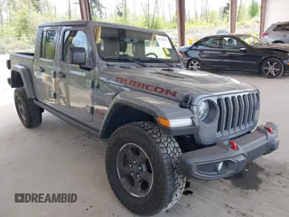 2022 Jeep Gladiator Rubicon z VIN 1C6JJTBG6NL166081, wystawiony jako IAAI lot #42204431 z przebiegiem 40 568 mil mil oraz . Historia ofert i sprzedaży dostępna na DreamBid. Obrazek 1.