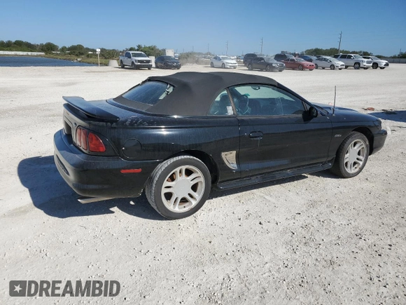 1996 Ford Mustang GT with VIN 1FALP45X3TF204806, listed as a Copart auction lot 84204974 with 137,676 mi miles and Salvage Title. Bid and sale history available at carsss.com. Image 3.