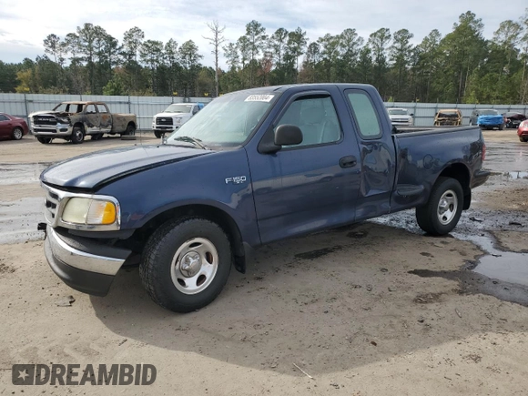 2003 Ford F-150 XL with VIN 1FTRX07273KB66549, listed as a Copart auction lot 83552004 with 205,026 mi miles and Salvage title. Bid and sale history available at DreamBid. Image 1.