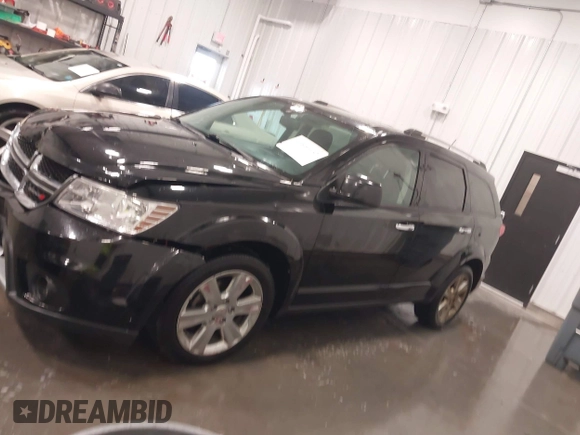 2014 Dodge Journey Limited with VIN 3C4PDDDG7ET154300, listed as a IAAI auction lot 41640132 with 175,276 mi miles and . Bid and sale history available at DreamBid. Image 14.