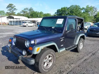 1998 Jeep Wrangler Sport with VIN 1J4FY19S8WP798559, listed as a IAAI auction lot 42162734 with 129,638 mi miles and . Bid and sale history available at DreamBid. Image 6.