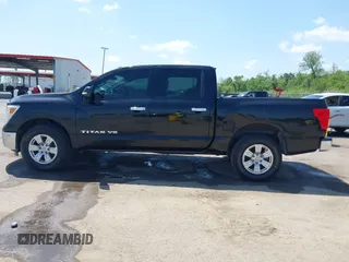 2018 Nissan Titan SV with VIN 1N6AA1EJ4JN529655, listed as a IAAI auction lot 42051405 with 153,599 mi miles and . Bid and sale history available at DreamBid. Image 14.