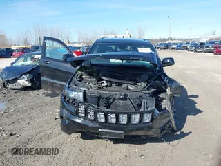 2019 Jeep Grand Cherokee Laredo E with VIN 1C4RJFAG6KC661777, listed as a IAAI auction lot 41762646 with 103,547 mi miles. Bid and sale history available at carsss.com. Image 12.