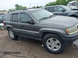 2003 Jeep Grand Cherokee Laredo z VIN 1J4GW48S73C545863, wystawiony jako IAAI lot #42222247 z przebiegiem 128 529 mil mil oraz . Historia ofert i sprzedaży dostępna na DreamBid. Obrazek 13.