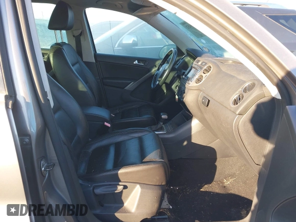 2010 Volkswagen Tiguan SEL with VIN WVGBV7AX0AW000279, listed as a IAAI auction lot 41389452 with 87,258 mi miles and . Bid and sale history available at DreamBid. Image 5.