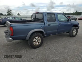 2000 Nissan Frontier XE with VIN 1N6ED27T3YC343320, listed as a Copart auction lot 64883025 with 168,047 mi miles and Clean title. Bid and sale history available at DreamBid. Image 3.