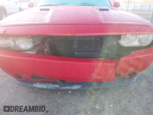 2011 Dodge Challenger z VIN 2B3CJ4DGXBH561850, wystawiony jako IAAI lot #41139802 z przebiegiem 155 948 mil mil oraz . Historia ofert i sprzedaży dostępna na DreamBid. Obrazek 6.