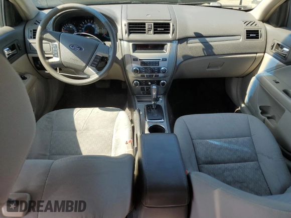 2012 Ford Fusion SE z VIN 3FAHP0HA0CR193143, wystawiony jako Copart lot #62696565 z przebiegiem 150 562 mil mil oraz Szkoda całkowita • Salvage title. Historia ofert i sprzedaży dostępna na DreamBid. Obrazek 8.