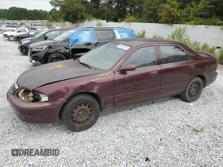 2000 Mazda 626 LX with VIN 1YVGF22D8Y5126950, listed as a Copart auction lot 69440124 with 208,584 mi miles and Salvage Title. Bid and sale history available at carsss.com. Image 1.