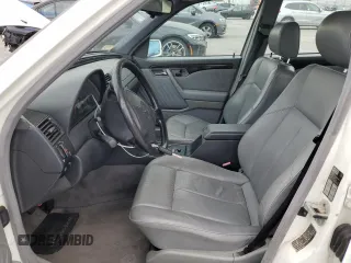 1997 Mercedes-Benz C with VIN WDBHA28E3VF582237, listed as a Copart auction lot 76826534 with 240,702 mi miles and Clean Title. Bid and sale history available at carsss.com. Image 7.