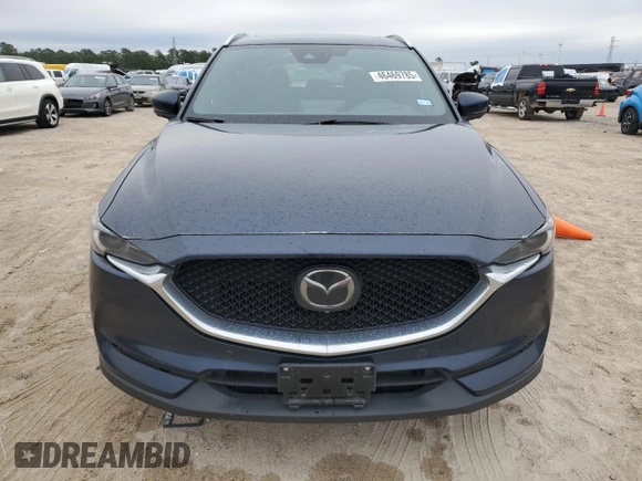 2021 Mazda CX-5 Signature with VIN JM3KFBEY9M0343758, listed as a Copart auction lot 46469785 with 41,757 mi miles and Salvage Title. Bid and sale history available at carsss.com. Image 5.