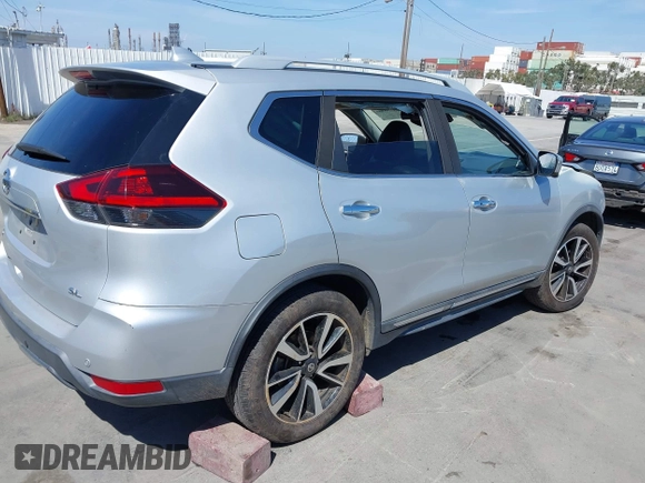 2019 Nissan Rogue SV with VIN 5N1AT2MT1KC788635, listed as a IAAI auction lot 42094964 with 50,431 mi miles and . Bid and sale history available at DreamBid. Image 4.