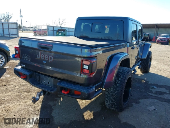 2020 Jeep Gladiator Rubicon with VIN 1C6JJTBG5LL179188, listed as a IAAI auction lot 41316367 with 136,670 mi miles and . Bid and sale history available at DreamBid. Image 4.