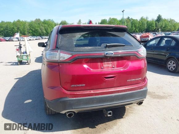 2015 Ford Edge Titanium z VIN 2FMTK3K87FBB46832, wystawiony jako IAAI lot #42358523 z przebiegiem 107 076 mil mil oraz . Historia ofert i sprzedaży dostępna na DreamBid. Obrazek 16.