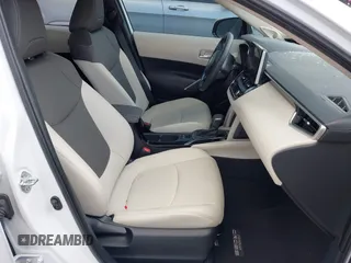 2024 Toyota Corolla Cross XLE with VIN 7MUDAAAG5RV097731, listed as a IAAI auction lot 42227874 with 9,151 mi miles and . Bid and sale history available at DreamBid. Image 5.