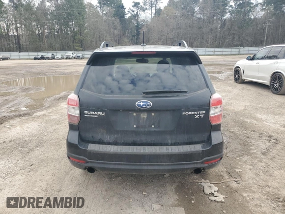 2014 Subaru Forester XT Touring with VIN JF2SJGMC2EH534565, listed as a Copart auction lot 44773305 with 142,537 mi miles and Salvage Title. Bid and sale history available at DreamBid. Image 6.