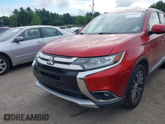 2017 Mitsubishi Outlander SE z VIN JA4AZ3A3XHZ059420, wystawiony jako IAAI lot #42611077 z przebiegiem 130 406 mil mil oraz . Historia ofert i sprzedaży dostępna na DreamBid. Obrazek 6.