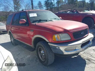 1998 Ford Expedition XLT z VIN 1FMPU18L2WLB69544, wystawiony jako IAAI lot #41694677 z przebiegiem 214 532 mil mil oraz . Historia ofert i sprzedaży dostępna na DreamBid. Obrazek 1.