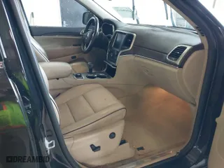 2014 Jeep Grand Cherokee Overland with VIN 1C4RJFCM4EC386398, listed as a IAAI auction lot 41696113 with 119,110 mi miles. Bid and sale history available at carsss.com. Image 5.