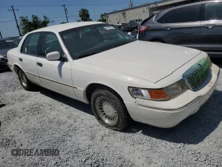 2000 Mercury Grand Marquis LS z VIN 2MEFM75W3YX689886, wystawiony jako Copart lot #54128735 z przebiegiem 54 819 mil mil oraz Szkoda całkowita • Salvage title. Historia ofert i sprzedaży dostępna na DreamBid. Obrazek 4.